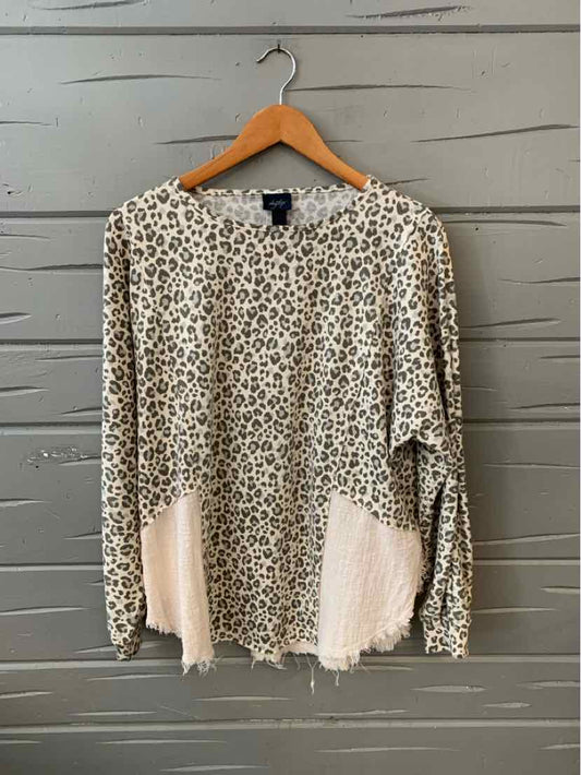 Gray leopard print long-sleeve top with light pink fringe detail on hem and sleeves.