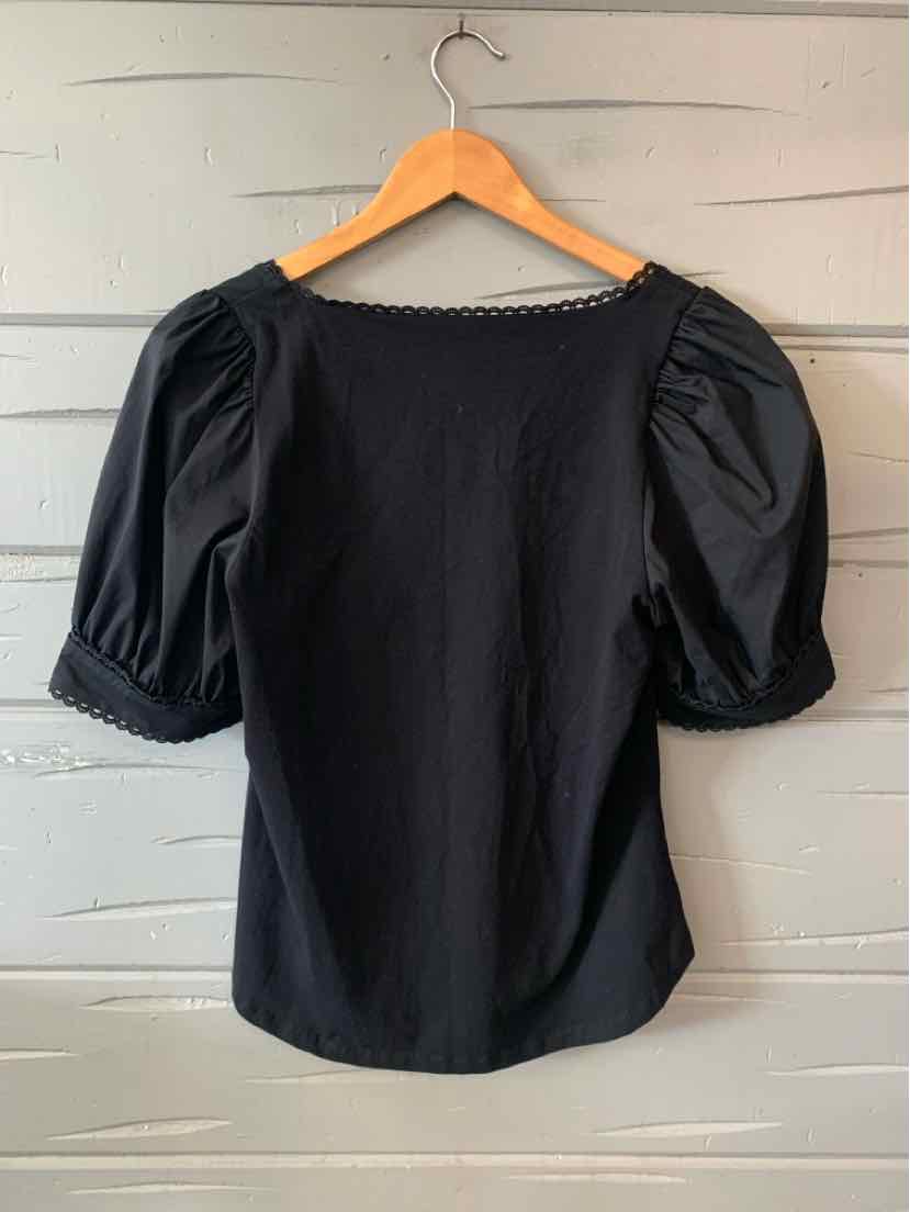 Black short puff-sleeve blouse with square neckline and lace trim on sleeves and neckline.