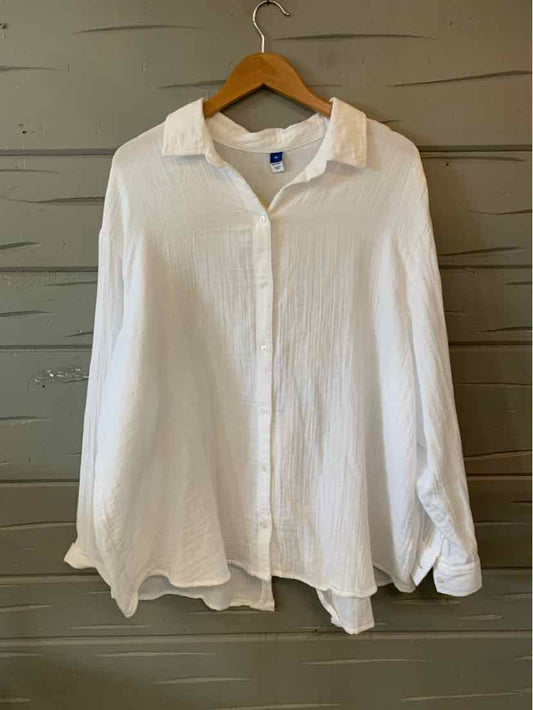 White long-sleeve button-up shirt in lightweight fabric with a relaxed fit and classic collar.