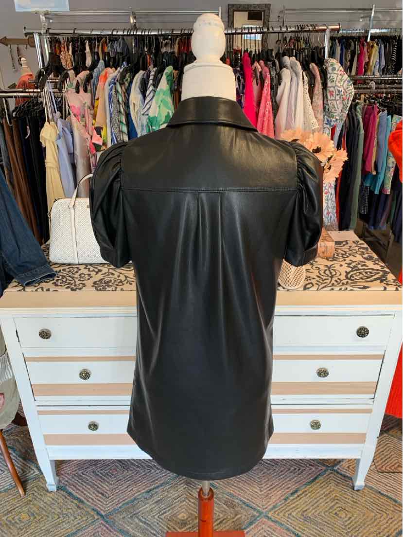 Black faux leather short-sleeve shirt with a smooth back and structured shoulders.