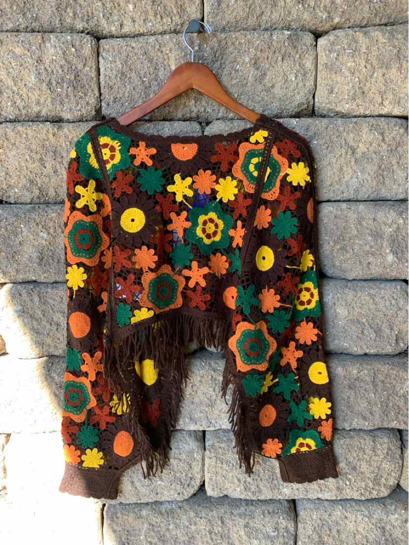 Brown House of Harlow floral cardigan with colorful embroidered flowers, open front, and long sleeves.