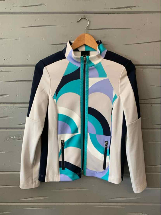 Teal and cream zip-up jacket with geometric swirl pattern, black side panels, and high collar.