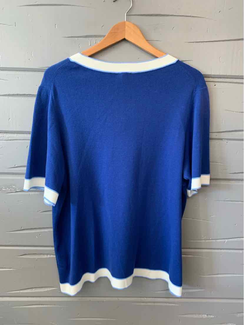 Blue short-sleeve sweater with white trim on neckline, sleeve edges, and hem, size 2X.