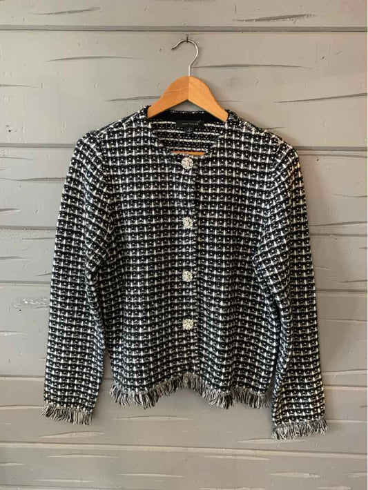 Black and white tweed jacket with silver buttons and frayed edges, medium size.