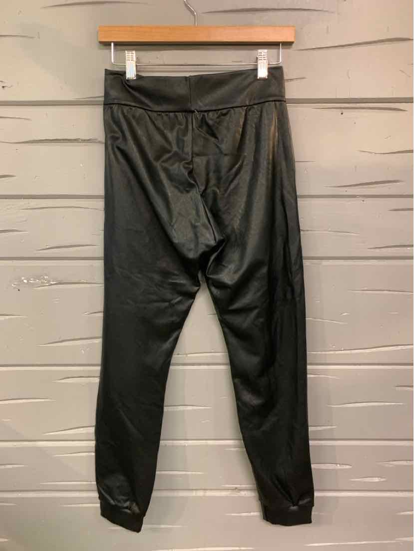 Black faux leather jogger pants with elastic waistband and tapered ankles in size XS.