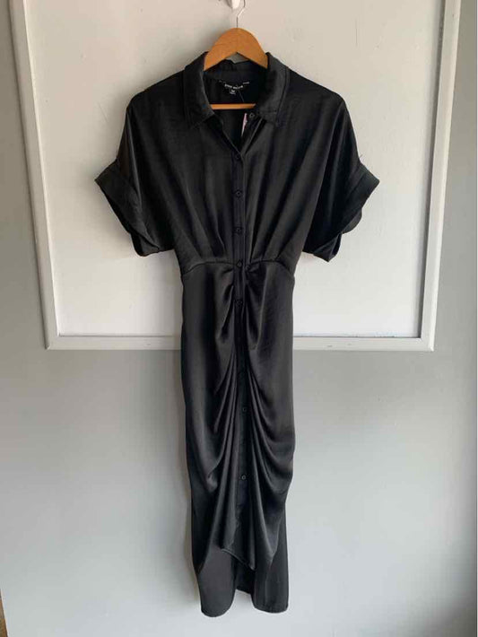Black short-sleeve midi dress with a collar and front tie waist detail.