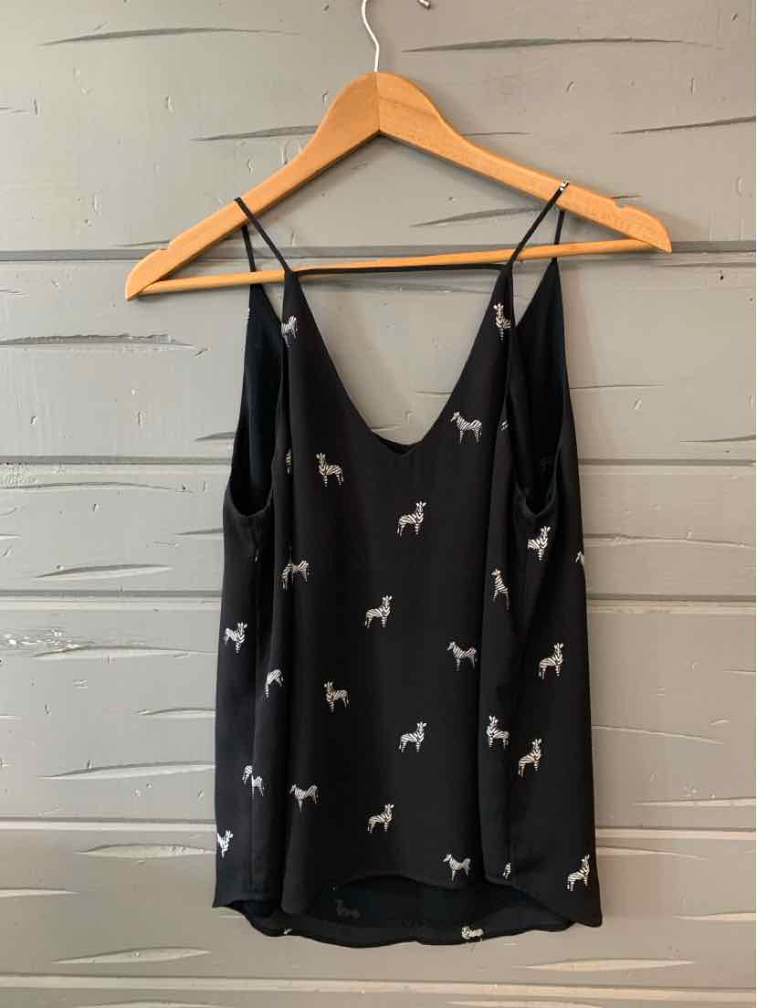 Black sleeveless loose-fit top with small white zebra print and thin adjustable straps.