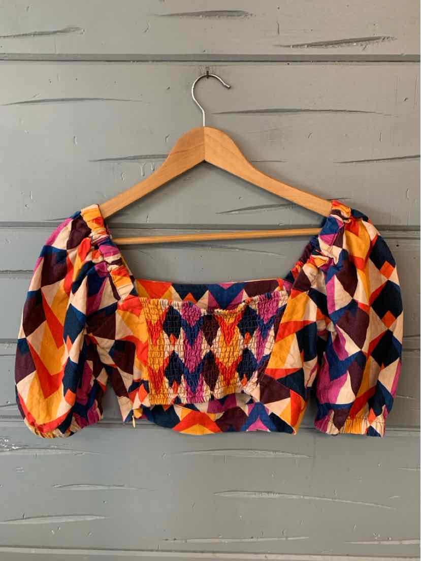 Colorful geometric-patterned crop top with puffed sleeves and square neckline in multi colors.