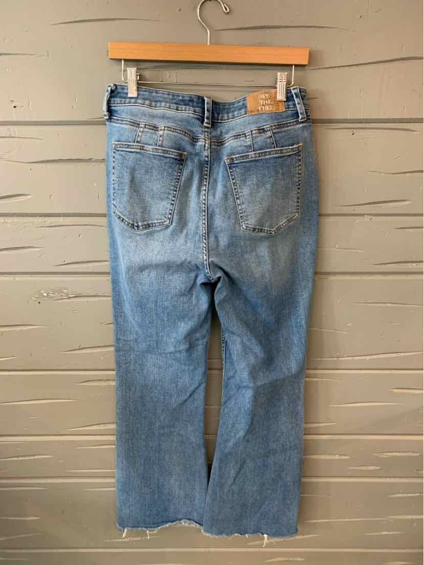 Light blue denim jeans with a straight leg cut and distressed detailing, back view.