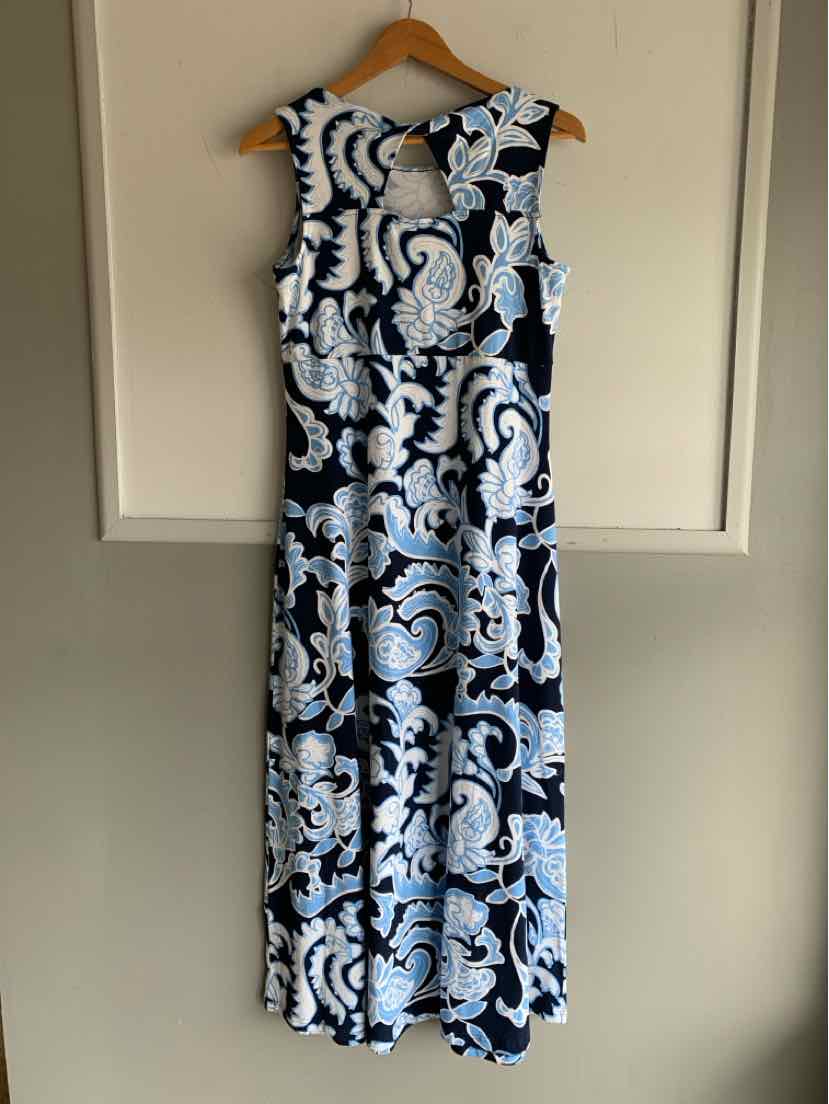 Sleeveless midi dress with black and white abstract floral pattern and keyhole neckline.
