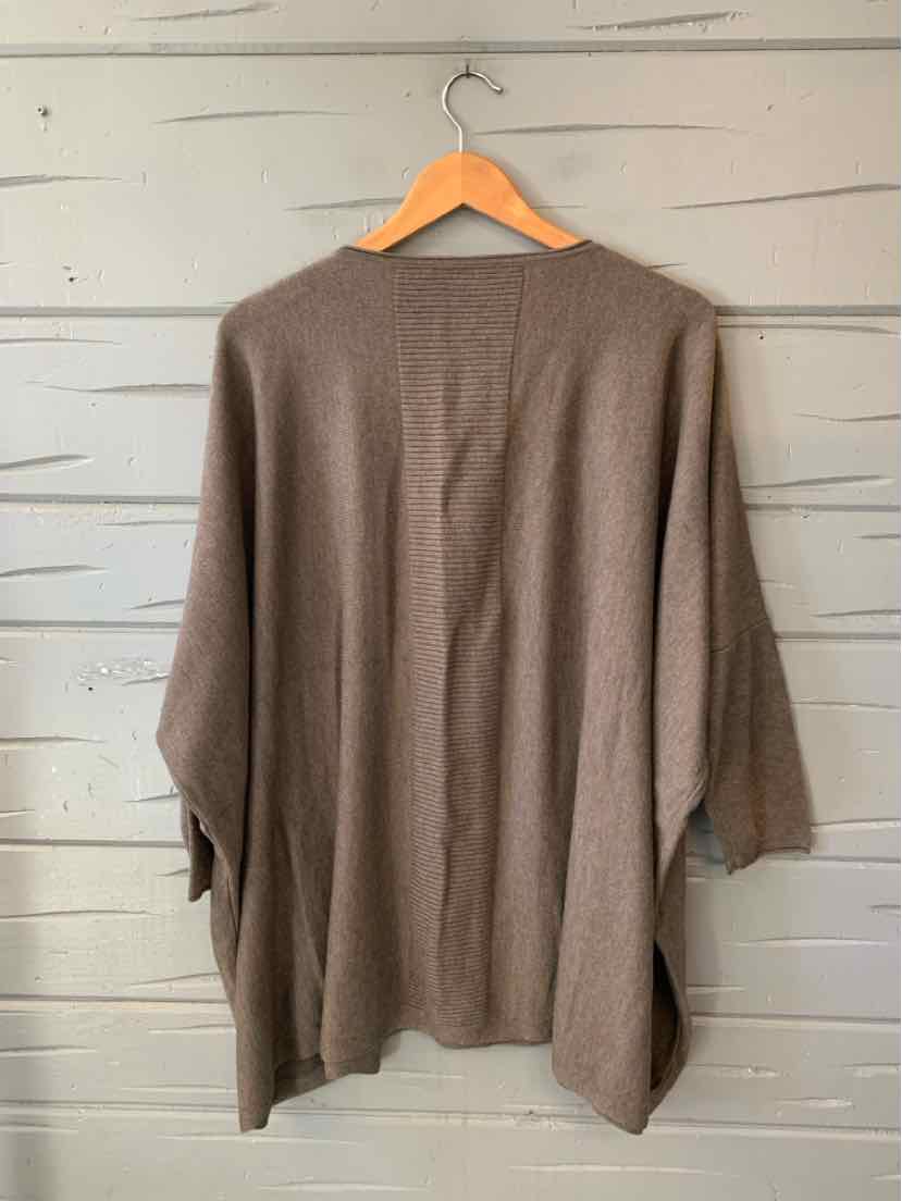 Taupe-brown loose-fit knit sweater with long sleeves and a rounded neckline, shown from the back.