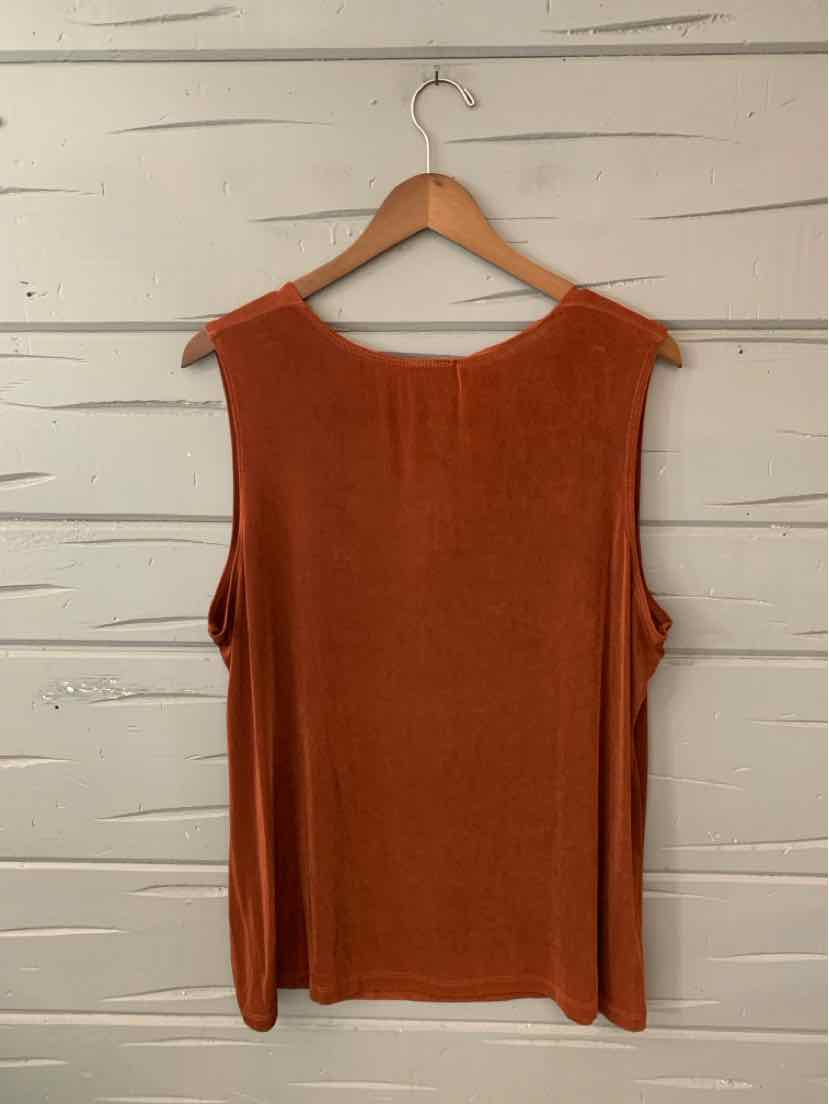 Rust-colored sleeveless knit top with scoop neckline and relaxed fit on wooden hanger.