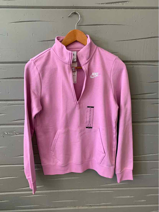 Women’s Nike pullover sweatshirt in solid pink with quarter zip and white logo on chest, size XS.