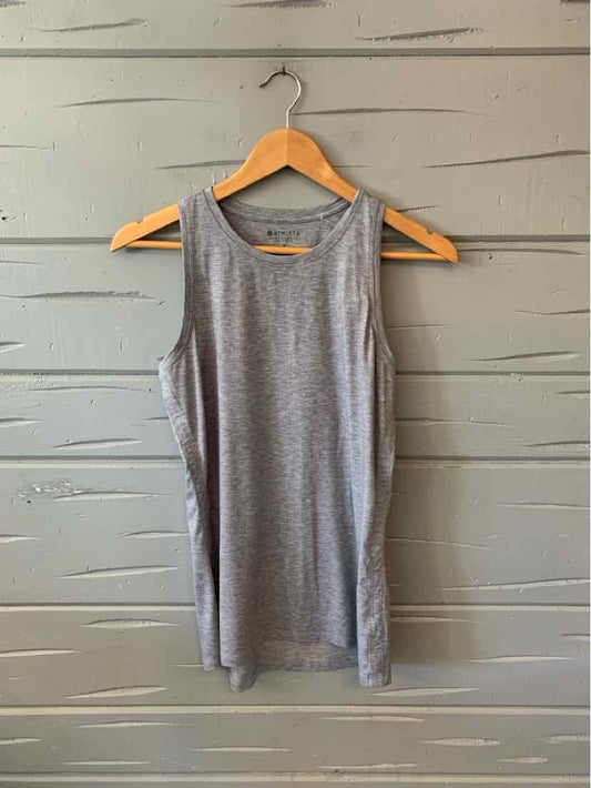 Gray sleeveless workout tank top with round neckline in small size hanging on wooden hanger.