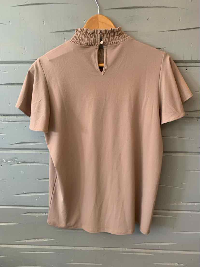 Beige short-sleeve blouse with ruffled mock neck and keyhole back button closure.