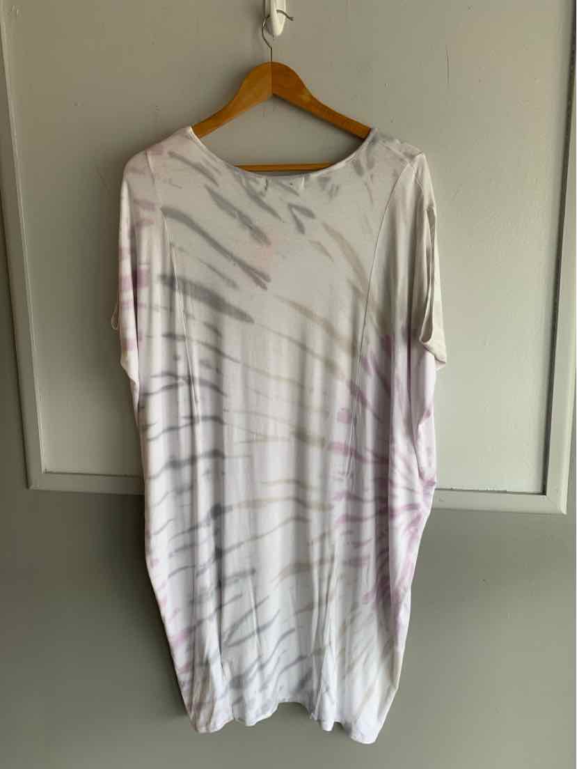 White oversized tie-dyed dress with light gray and lavender streaks, short sleeves, and a round neckline.