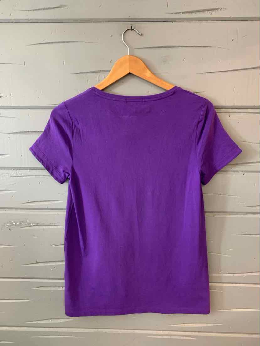 Solid purple short-sleeve crew neck t-shirt in size small hanging on wooden hanger.