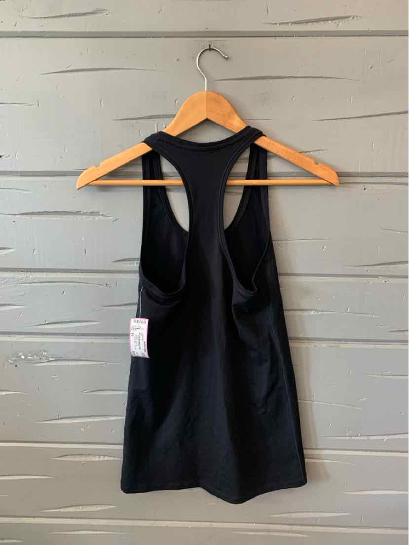 Black racerback athletic tank top with a fitted, stretchy fabric in size XS hanging on a wooden hanger.