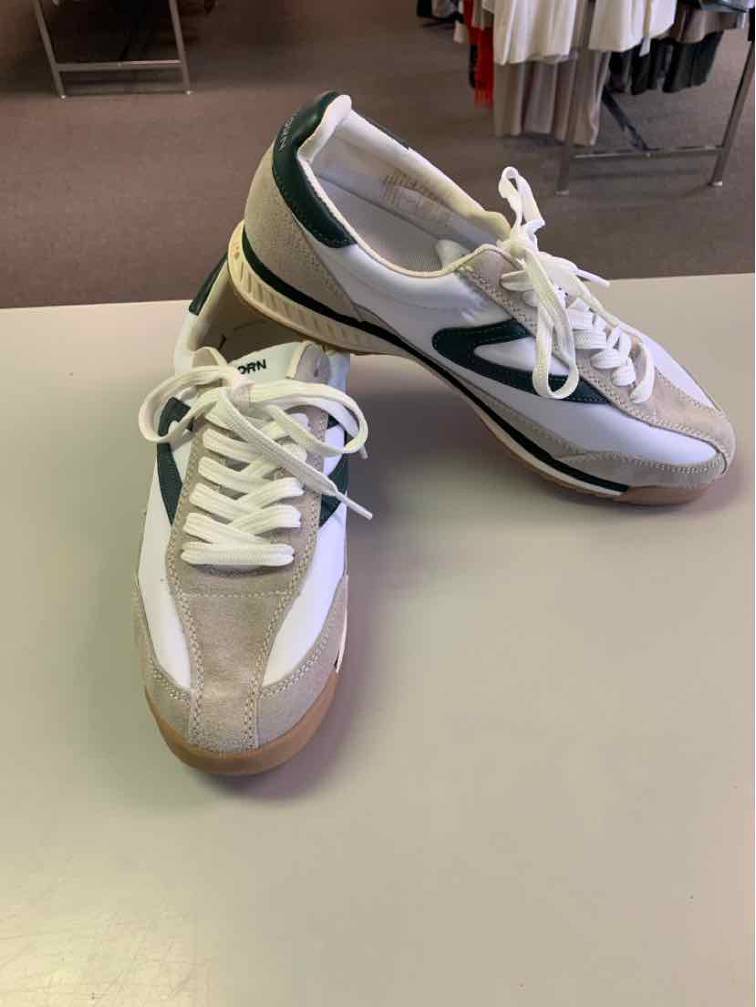 White and green low-top sneakers with suede accents and gum rubber soles, size 10.