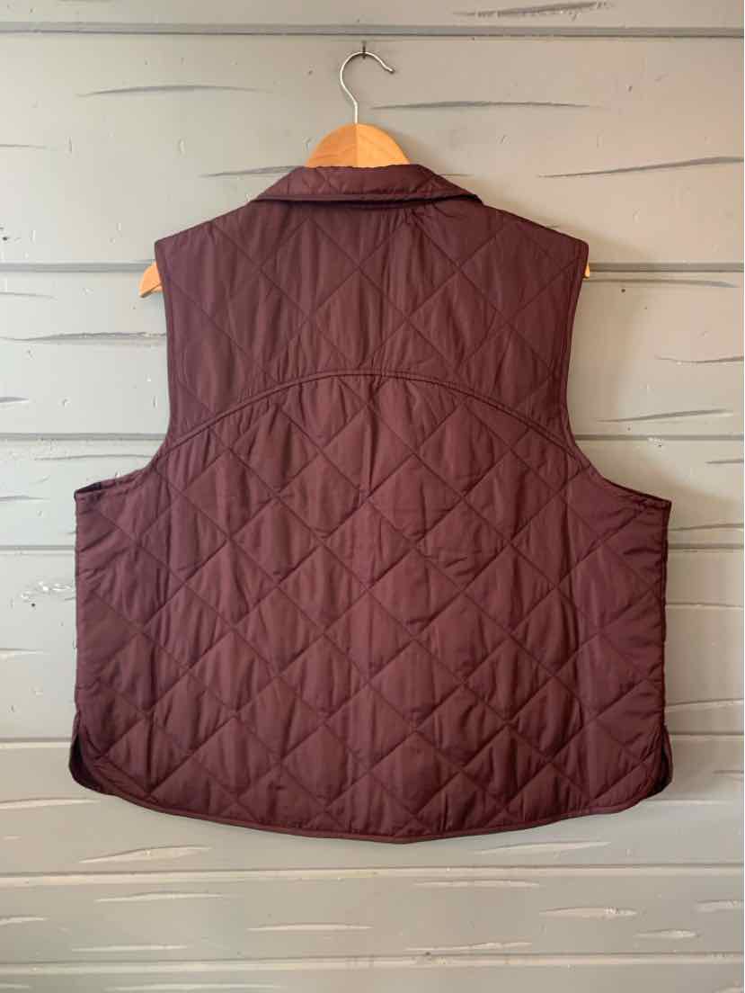 Quilted burgundy sleeveless vest with collar and diamond stitch pattern.