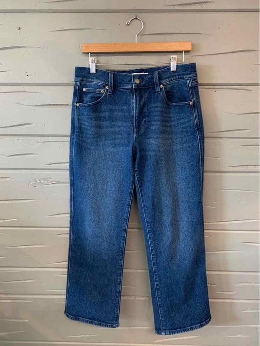 Blue straight-leg denim jeans with five-pocket design and button closure, size 12P.