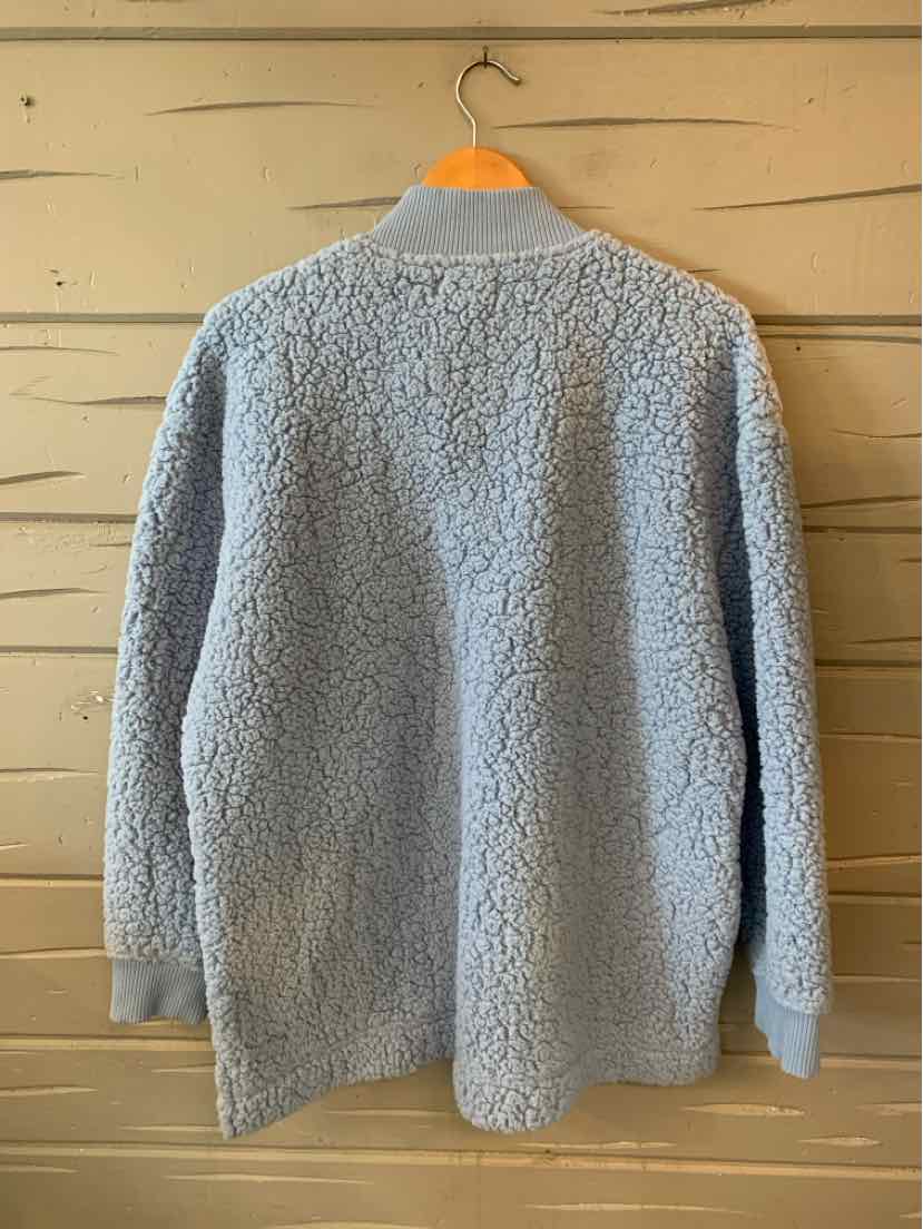 Light gray Maurices cardigan with a soft textured knit, long sleeves, and open front, shown from the back.