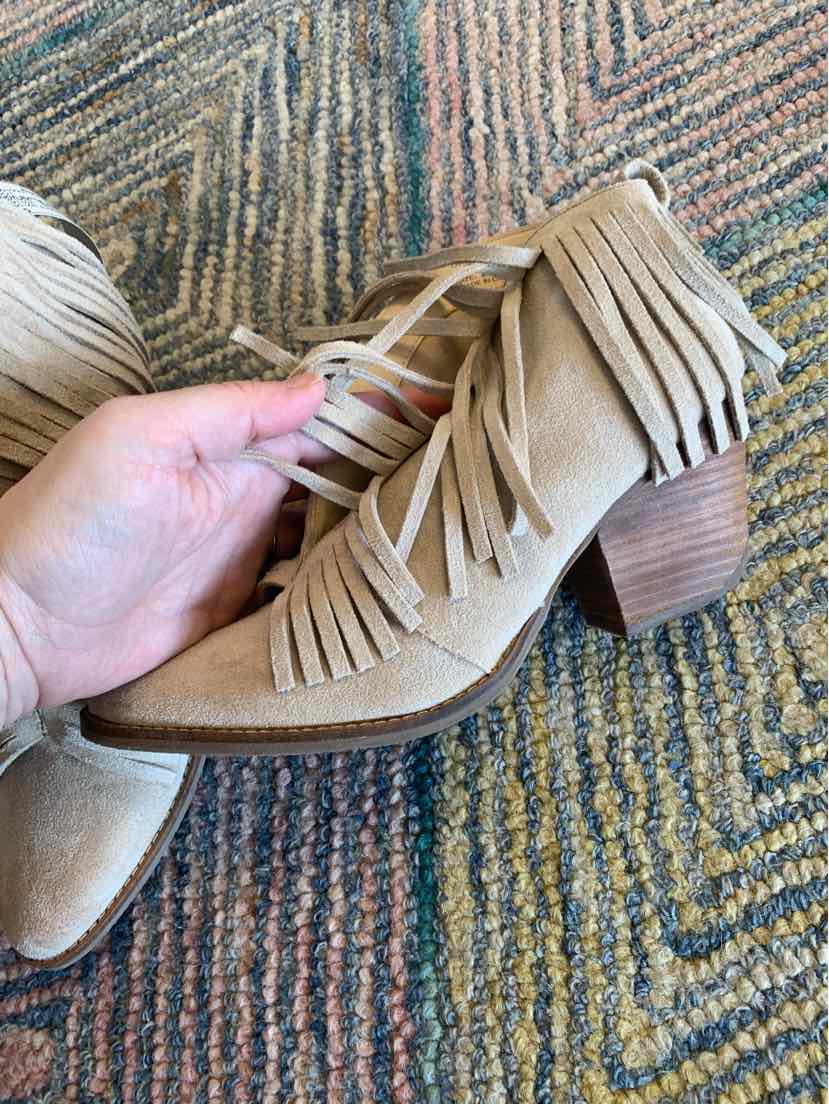 Beige suede ankle boot with fringe detailing and stacked wooden heel, size 8.5.
