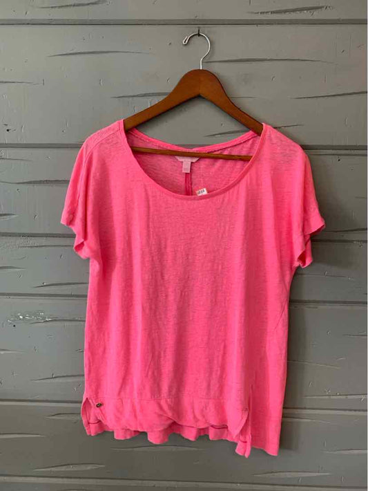 Bright pink short-sleeve scoop neck lightweight cotton T-shirt with relaxed fit.