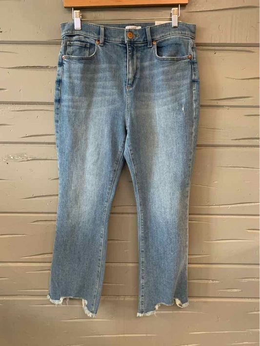 Blue high-waist denim jeans with slight fading, straight leg, and raw hem detailing.