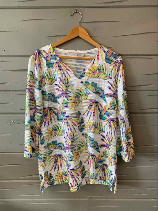 White long-sleeve tunic with colorful tropical leaf print and V-neck in size XL.