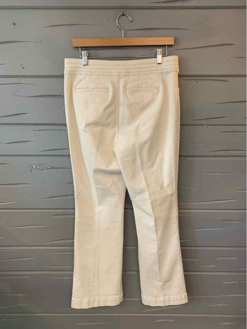White cotton blend pants with straight legs and back patch pockets, size 10P.