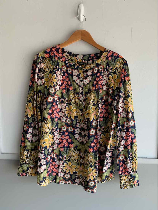 Long-sleeve floral blouse in multicolor with pink, yellow, and green on black background, size XL.