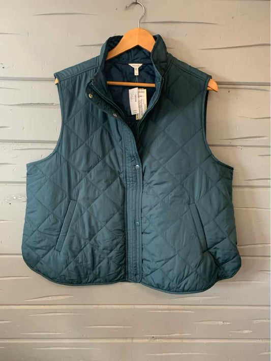 Teal quilted sleeveless vest with snap front closure and stand collar, size 1X.