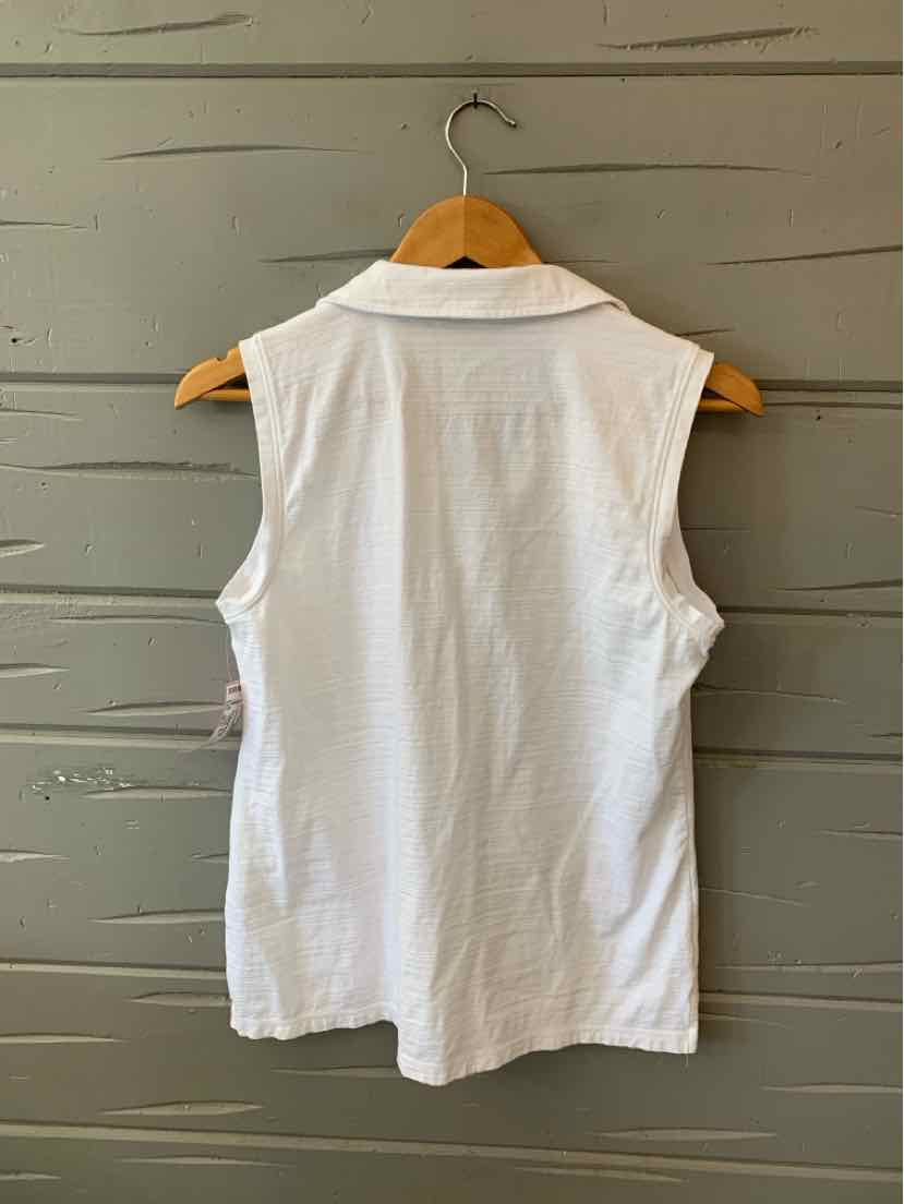 White sleeveless blouse with a pointed collar, straight hem, and lightweight fabric hanging on wooden hanger.