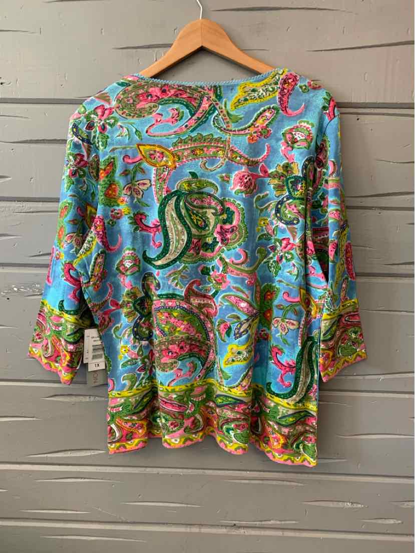 Lightweight long-sleeve blouse with colorful paisley print on turquoise background, loose fit, size 1X.