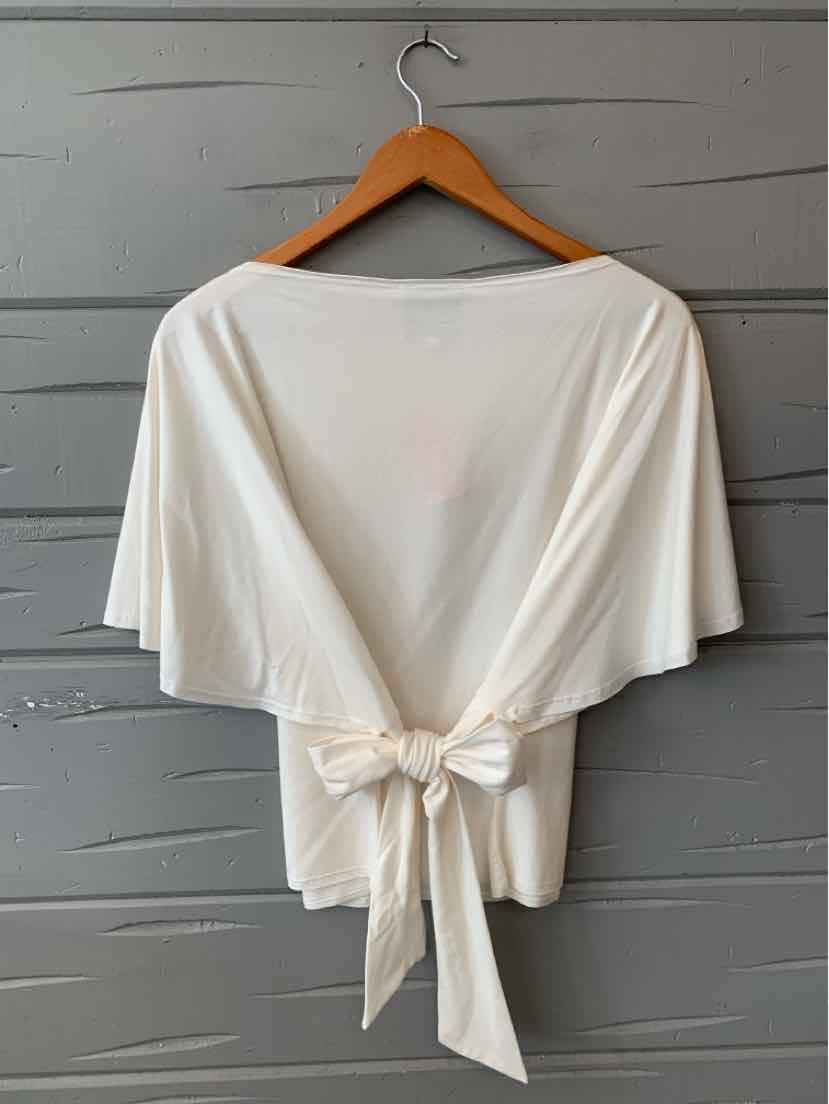 White short-sleeve blouse with wide boat neckline and tied bow at the waist, size XL.