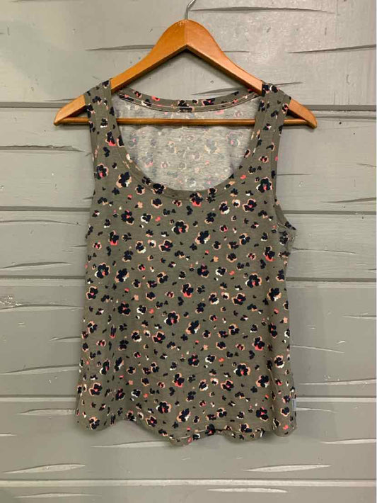Olive green sleeveless tank top with multicolor small floral print and scoop neckline.