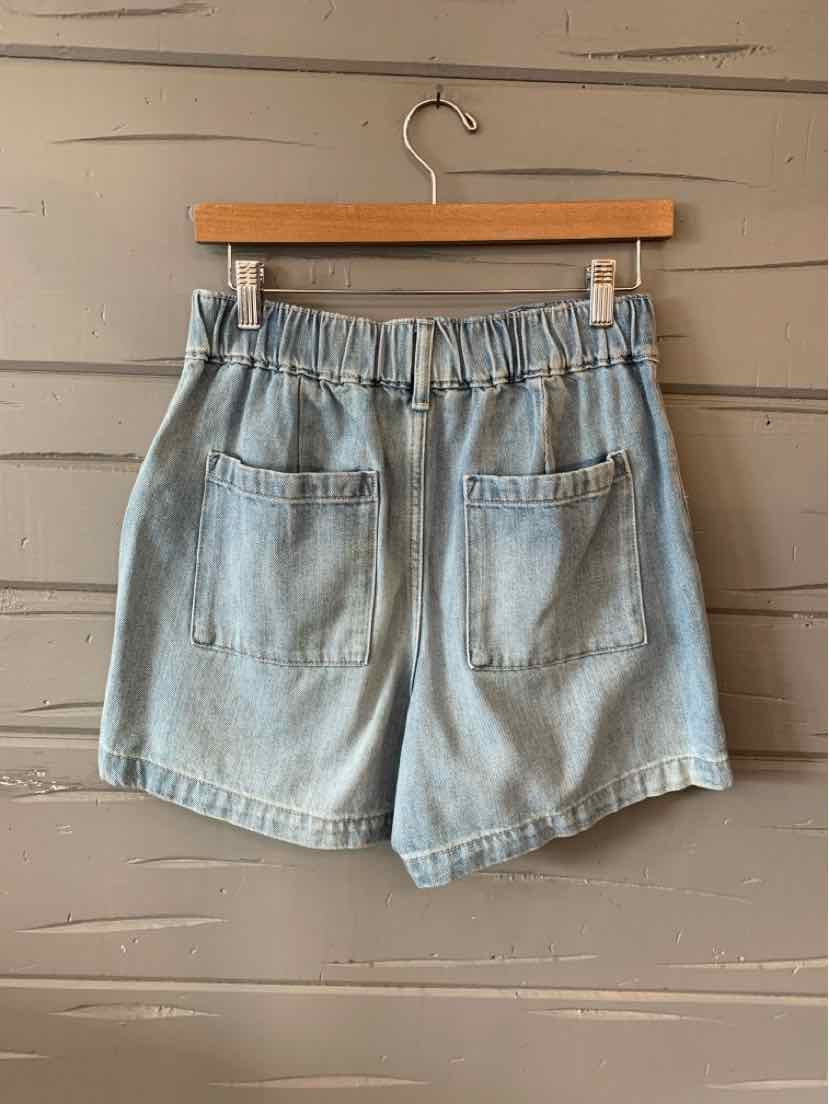Light blue denim shorts with an elastic waistband and two back patch pockets.