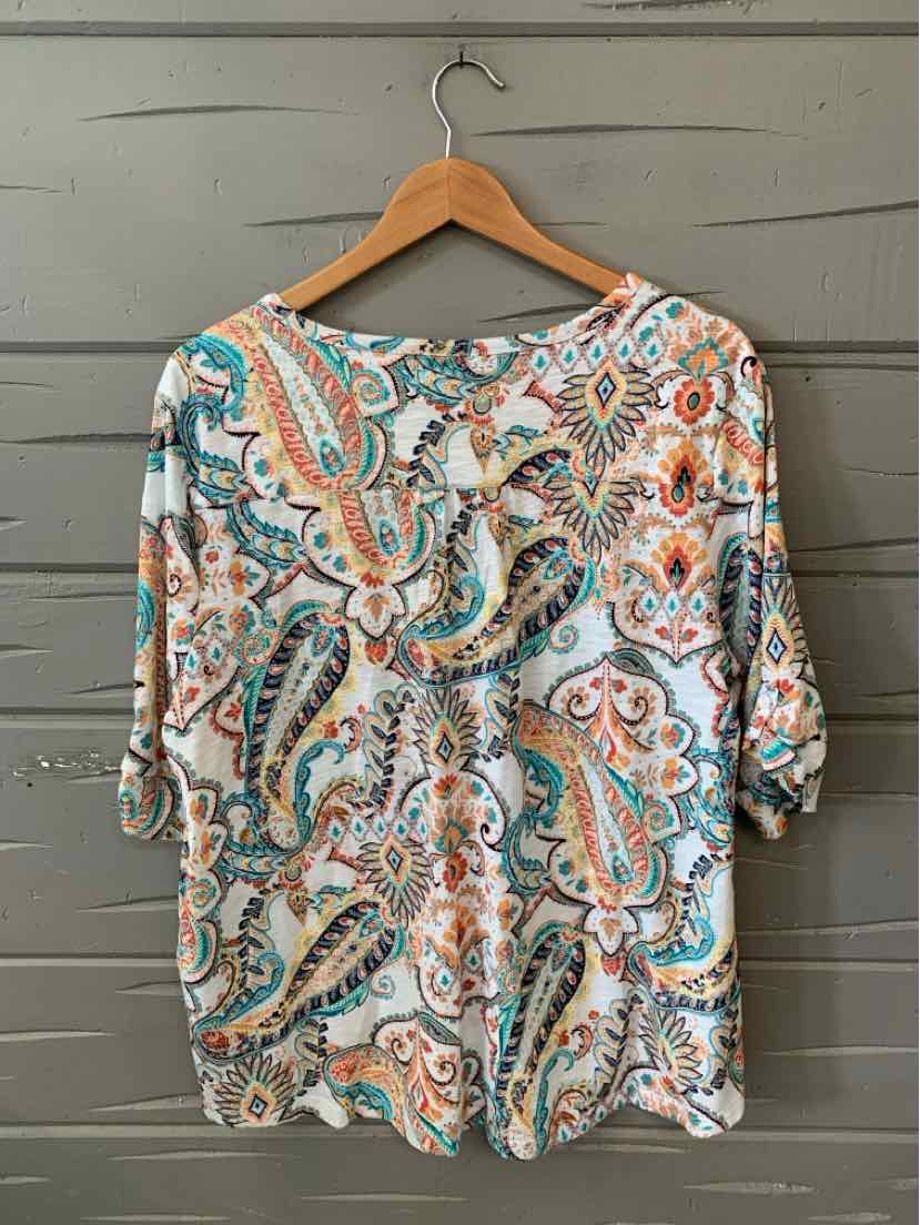 Chicos XXL multicolor paisley blouse with 3/4 sleeves and scoop neckline on wooden hanger.