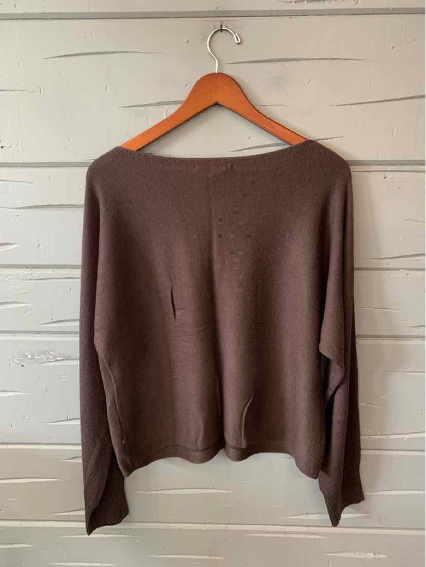 Brown women’s sweater with a wide boat neckline, long sleeves, and a relaxed draped fit.