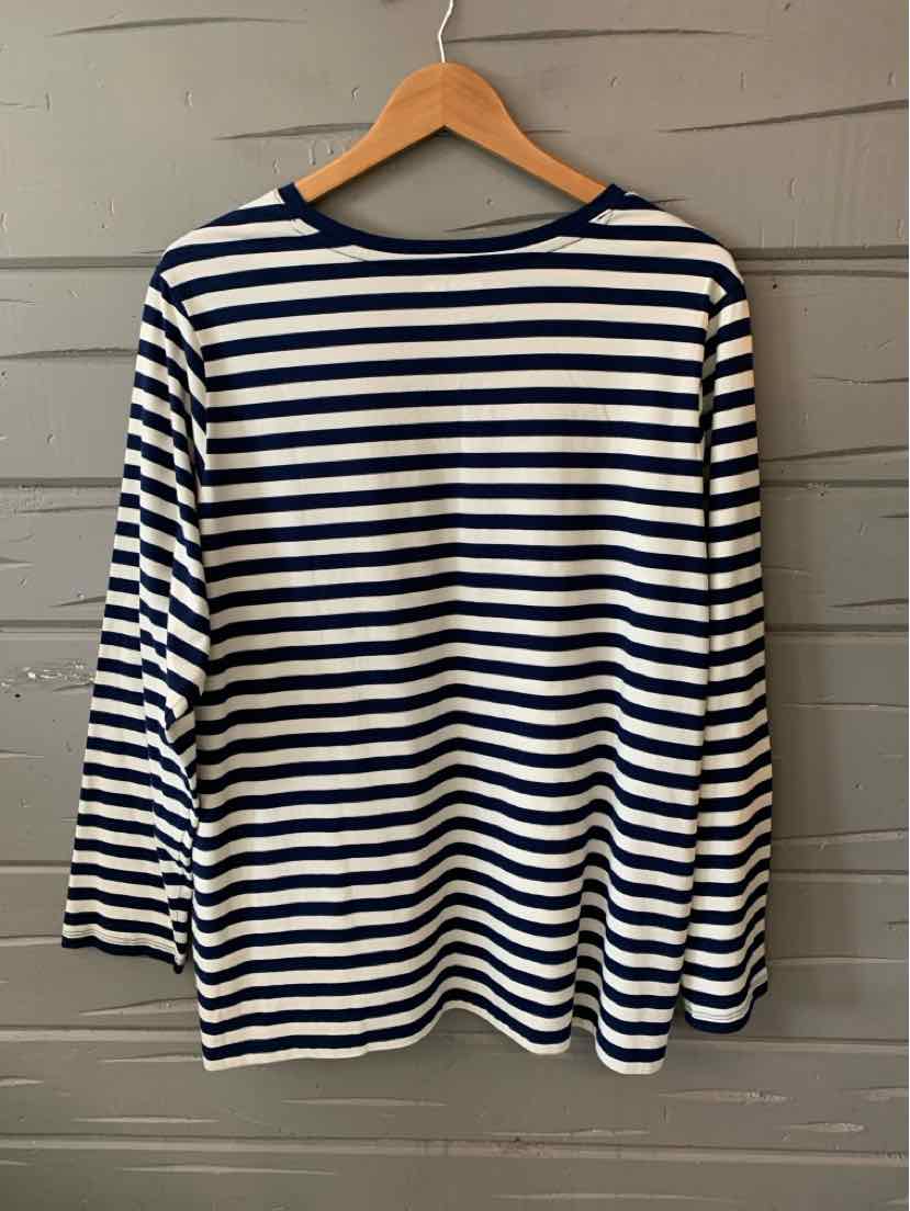 White long-sleeve shirt with navy blue horizontal stripes and a round neckline.