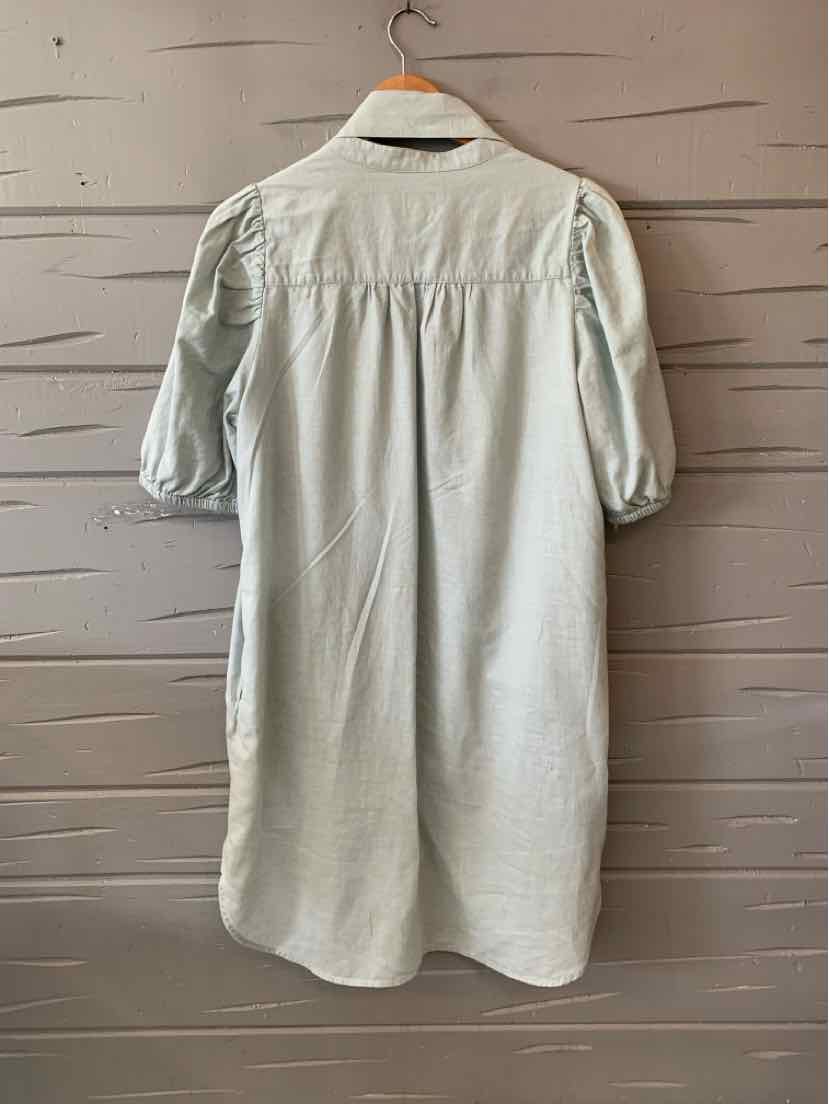 Mint green long sleeve dress with gathered back yoke, loose fit, and knee-length hem.