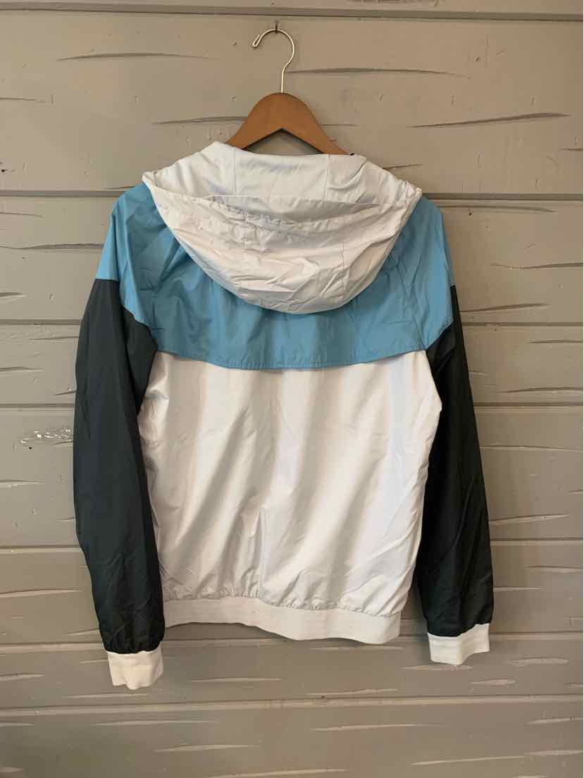 White and light blue color-blocked Nike windbreaker with black sleeves and a hood.