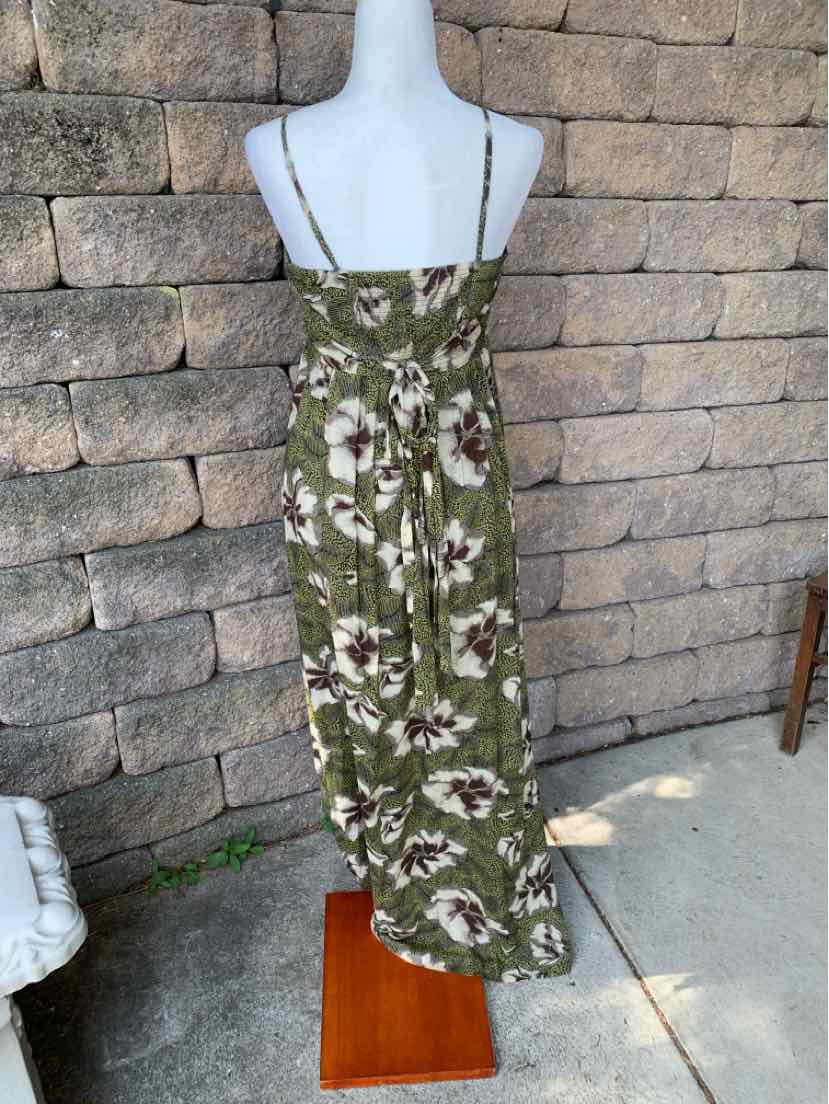 Olive green floral maxi dress with thin spaghetti straps and a flowy silhouette.
