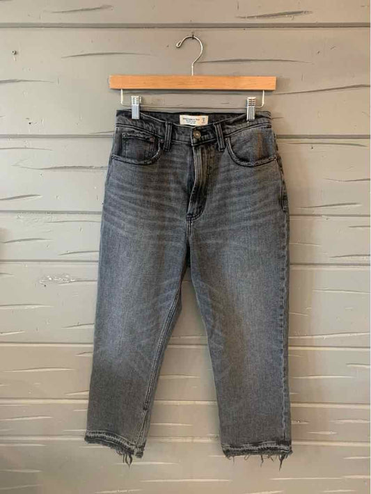 Black high-waisted straight-leg jeans with frayed hems from Abercrombie & Fitch, size 6.