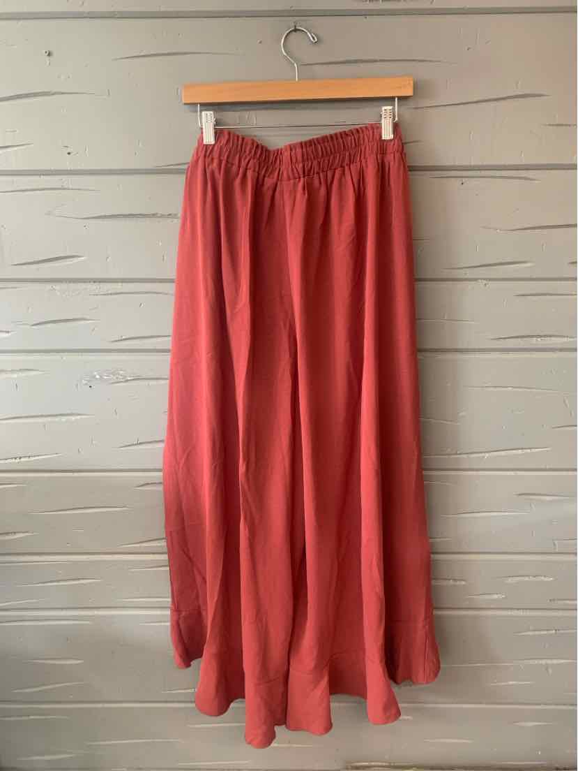 Mauve wide-leg pants with elastic waistband and flowy, lightweight fabric in size 18-20.