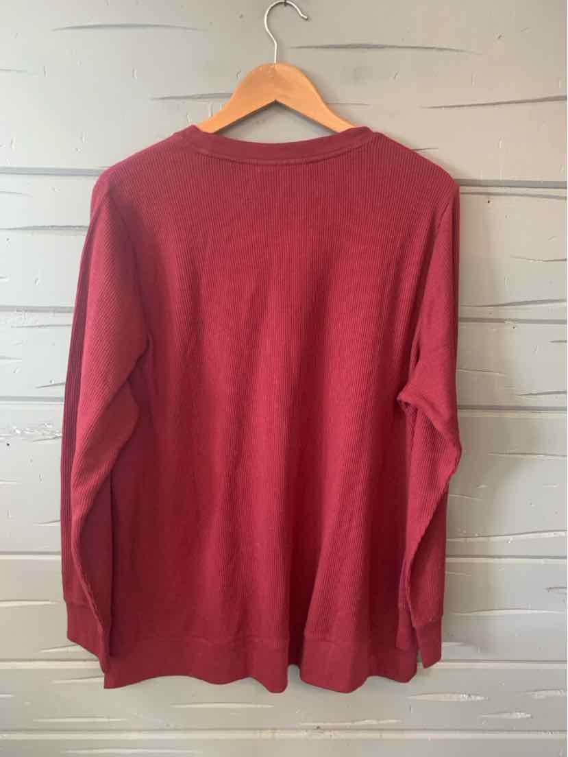Long-sleeve solid burgundy shirt with crew neckline in size 14/16 hanging on wooden hanger.