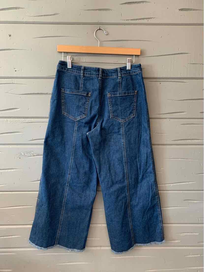 Dark blue wide-leg denim jeans with high waist and back patch pockets, size 8.