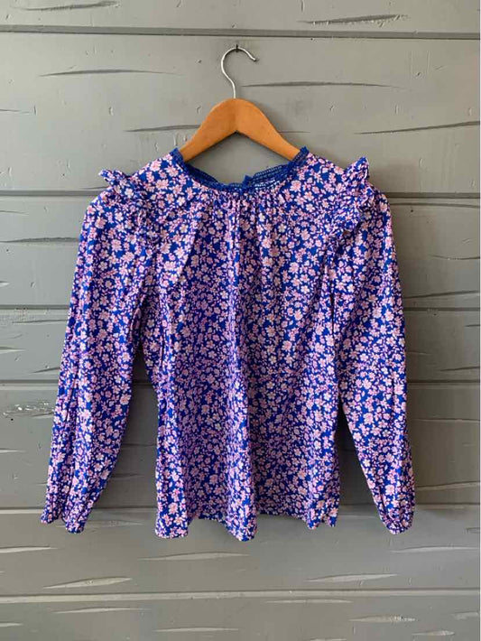 Blue floral long-sleeve blouse with ruffled neckline and gathered detail at shoulders, size XS.