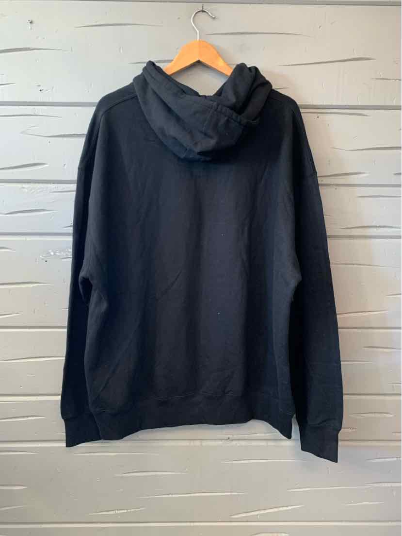 Black long-sleeve pullover hoodie with a simple, unadorned back and ribbed cuffs and hem.